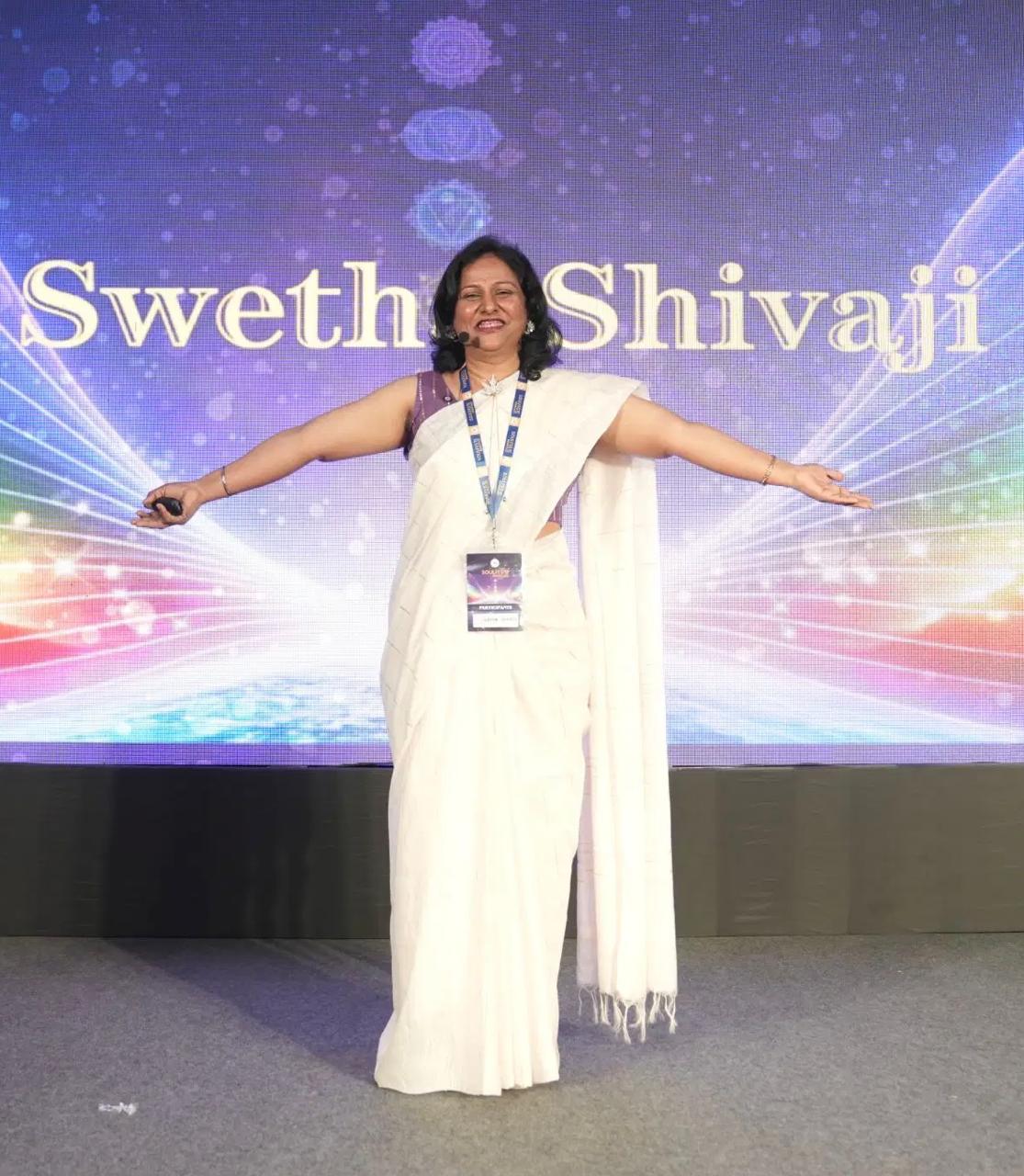 Swetha Shivaji speaking on stage